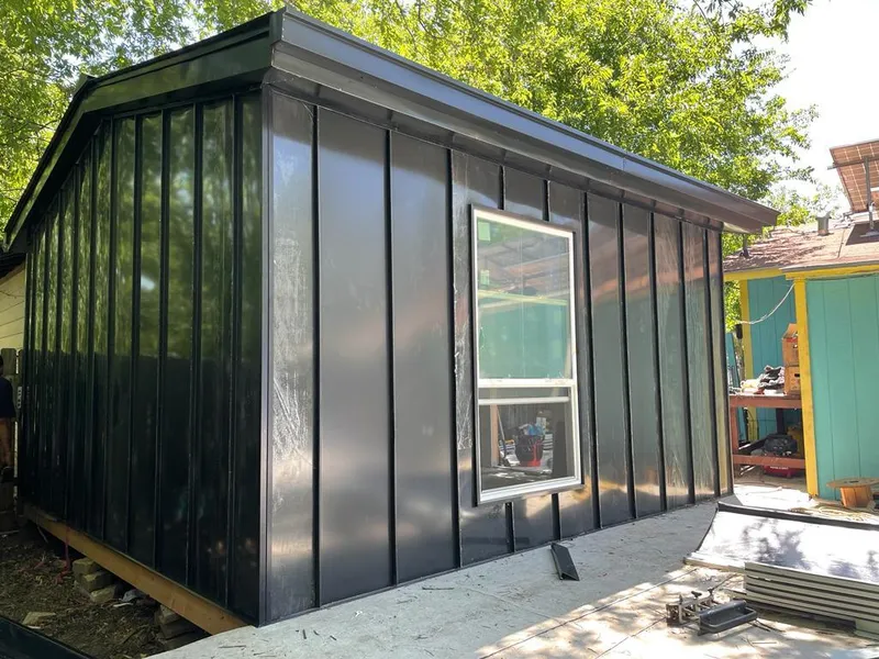 Black standing seam metal wall panels for Metal Roof Installation in Rothschild