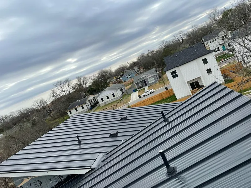 Standing seam metal roof panels with vents for Skylight Repair in Rothschild